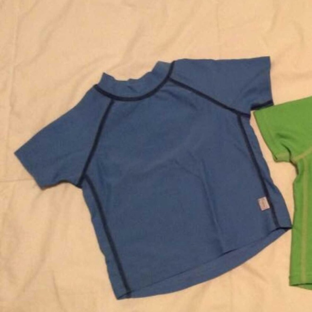 3/25$ Rash guard/swim shirt (blue).  3-6m